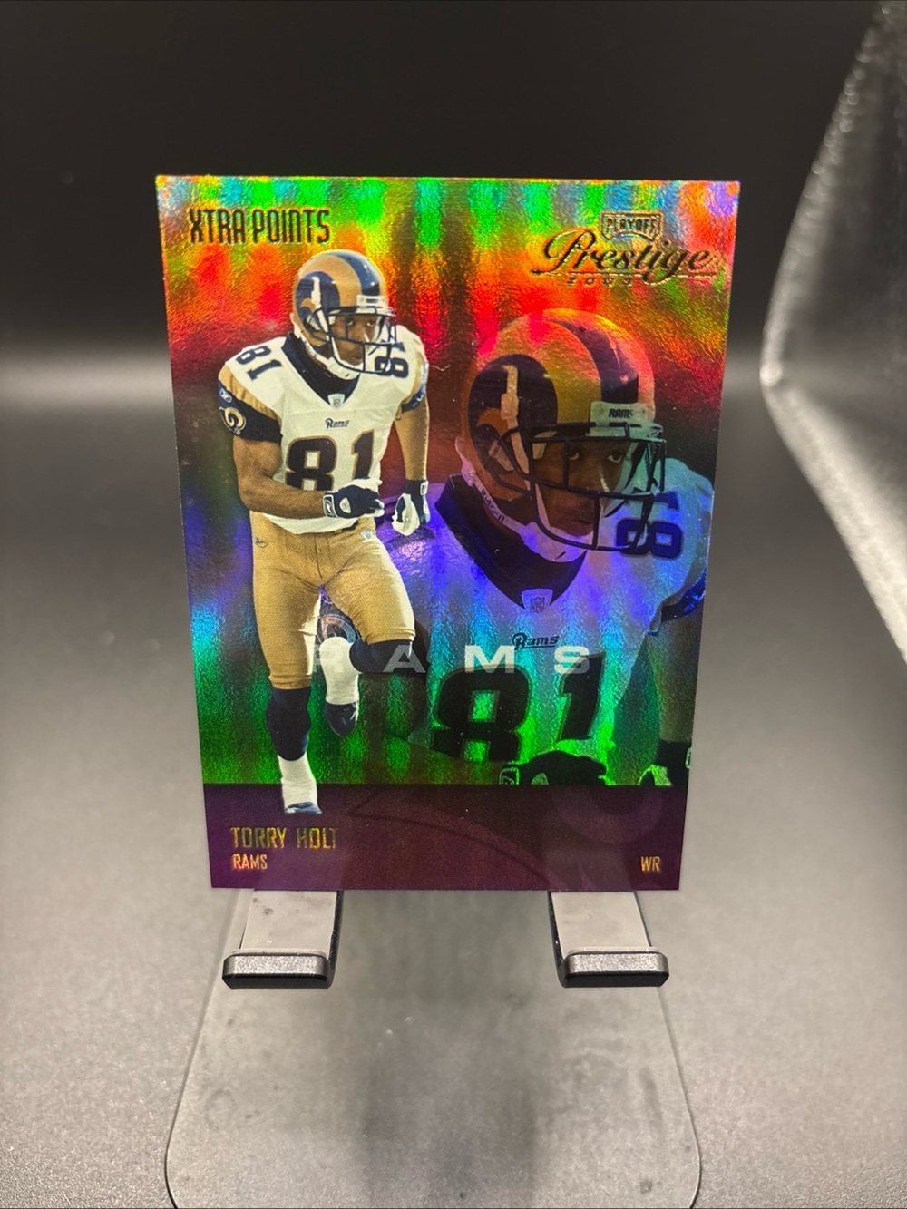 2003 Playoff Prestige Xtra Points #134 Torry Holt - serial # 063/100